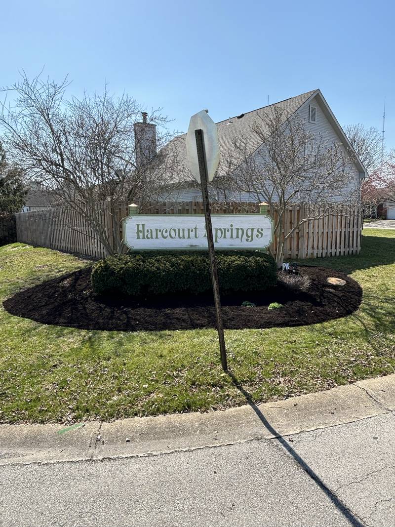 Monument sign bed, freshly mulched