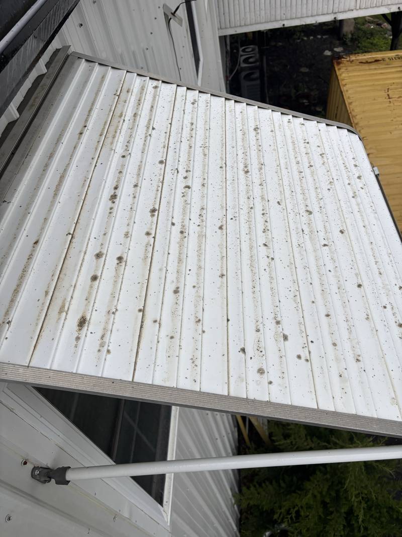 Metal awning before cleaning